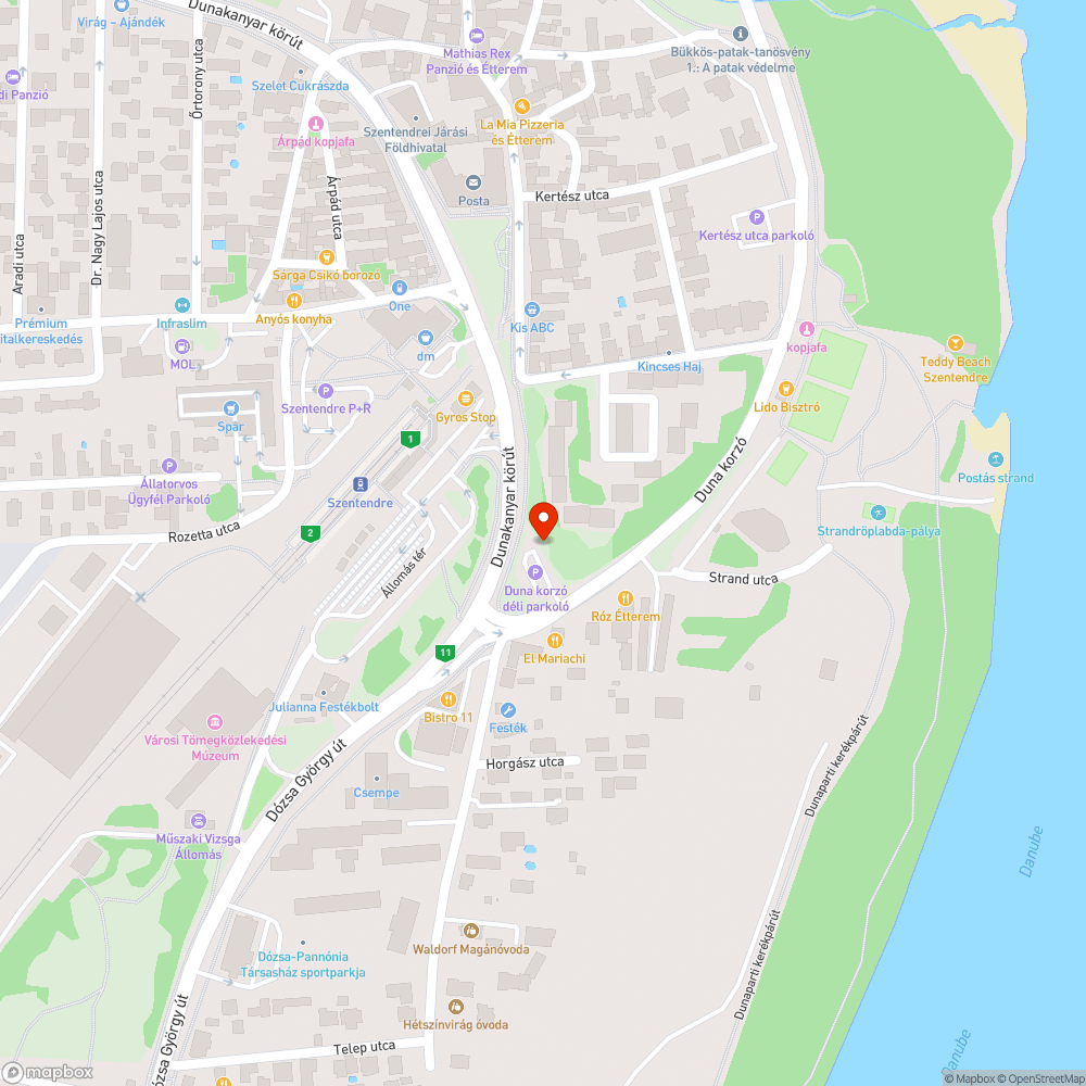 Rózsa kert és 11-es főút közötti parkolóban illegálisan lerakott szemét elszállítása bejelentés helye