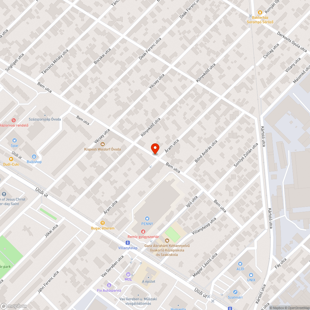 Vas és betonoszlopok az úttest mellett bejelentés helye