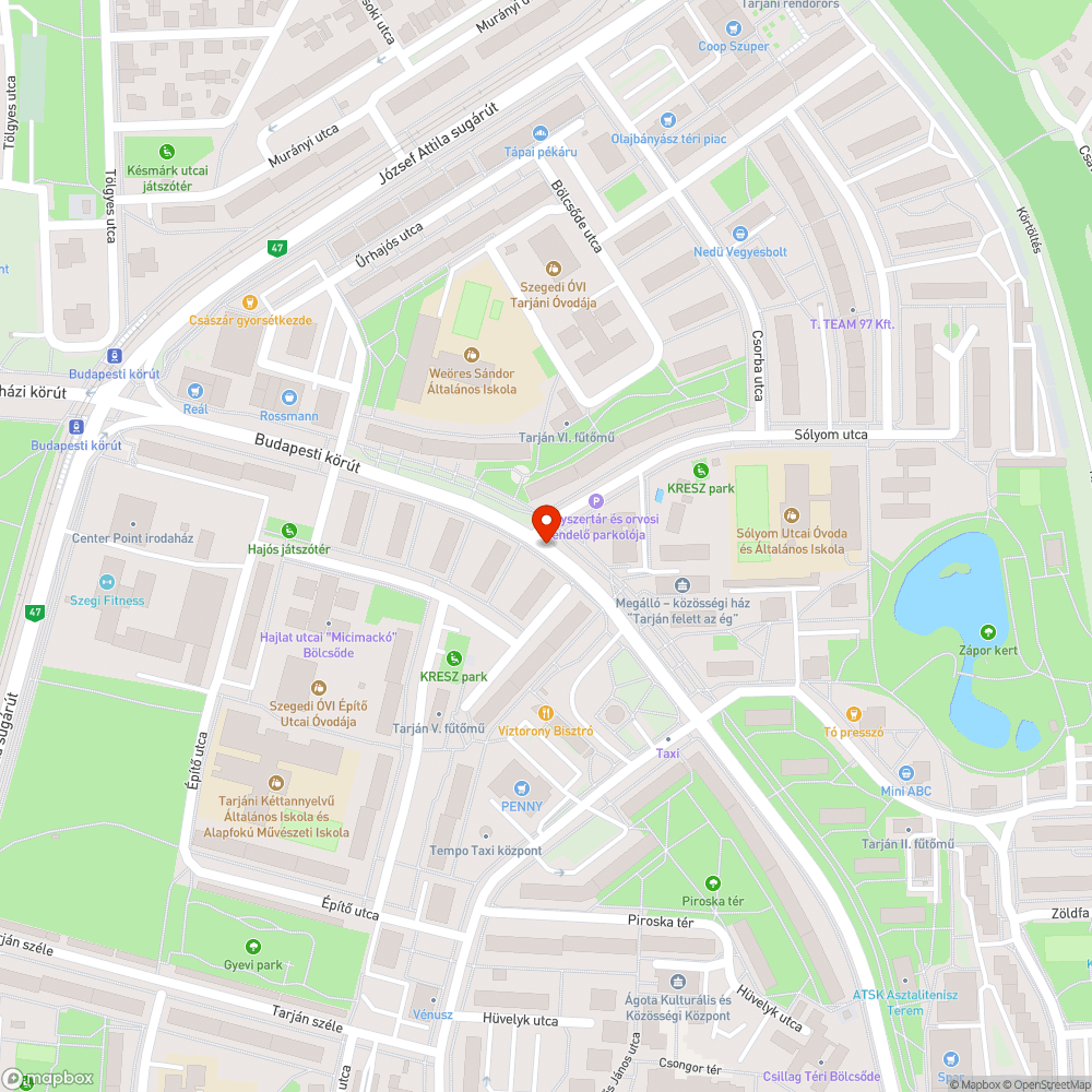 Betontörmelék a felújított járda mellett a fűben - Budapesti körút bejelentés helye